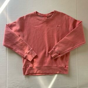 Women champion 100%authentic crewneck sweater size Small  peach color .